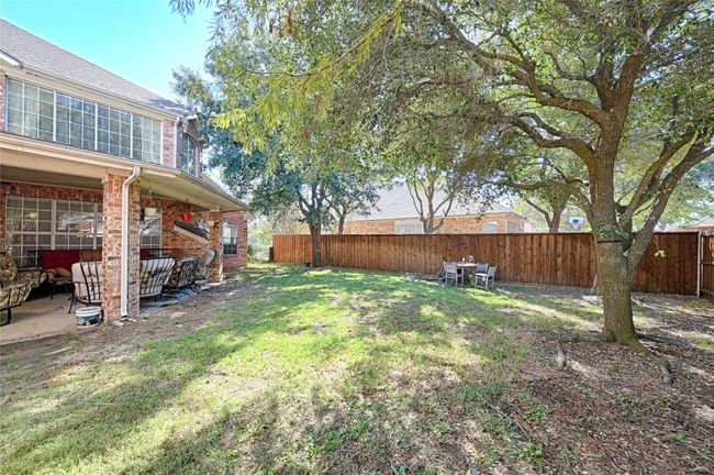 View of yard with a patio area and a fenced backyard | Image 36