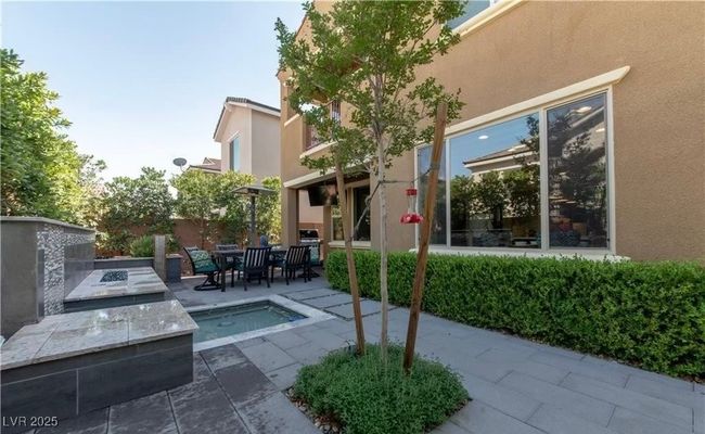 View of patio / terrace with a fire pit | Image 14
