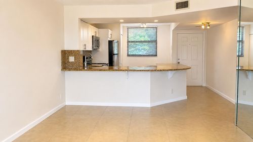 210-115 Lake Emerald Dr, Oakland Park, FL, 33309-6251 | Card Image