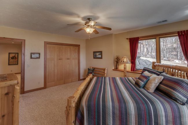 walk out level guest bedroom | Image 35
