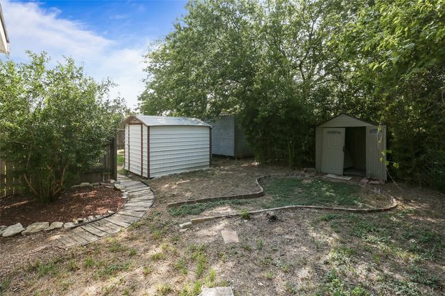 View of yard featuring a shed | Image 18