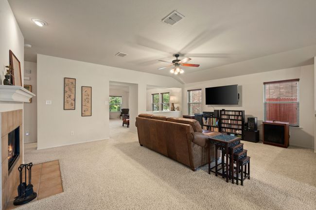A full view of the open living space flowing into the kitchen and dining nook—ideal for gatherings and everyday comfort. | Image 13