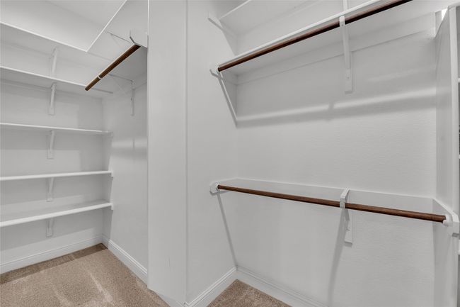 View of spacious closet | Image 19