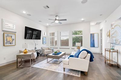 Wood plank flooring throughout the first floor | Image 3