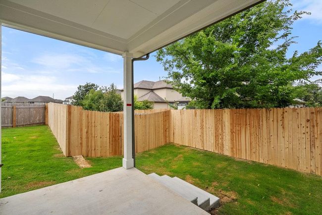 Fenced backyard featuring a patio area | Image 23
