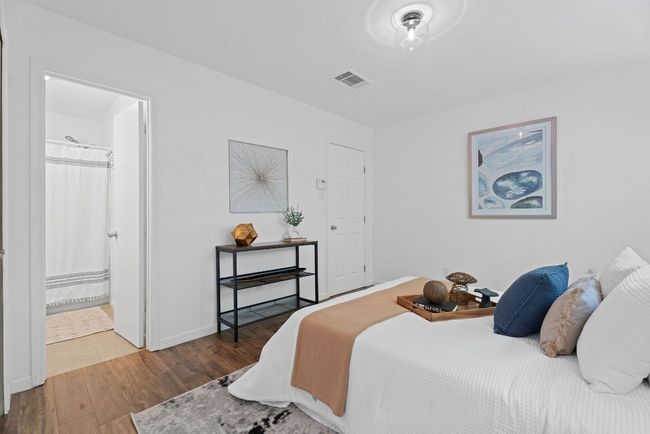 Primary bedroom with two closets and a full en suite bathroom | Image 13