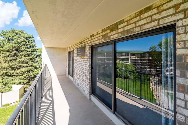 Balcony has two sliding doors | Image 11