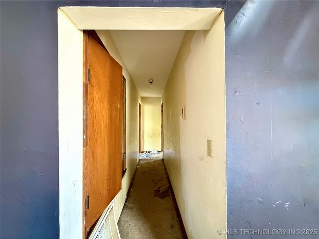 HALLWAY TO THE 2 OR 3 BEDROOMS AND PRIMARY BATHROOM | Image 17