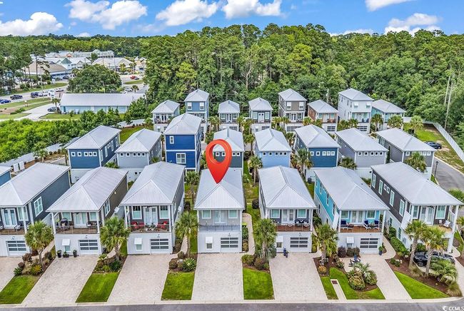 Aerial perspective of suburban area featuring a forest | Image 32
