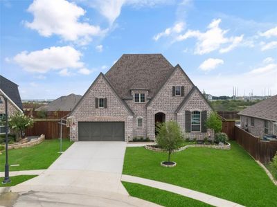 Front view of this beautiful Highland home and sidewalk. | Image 3