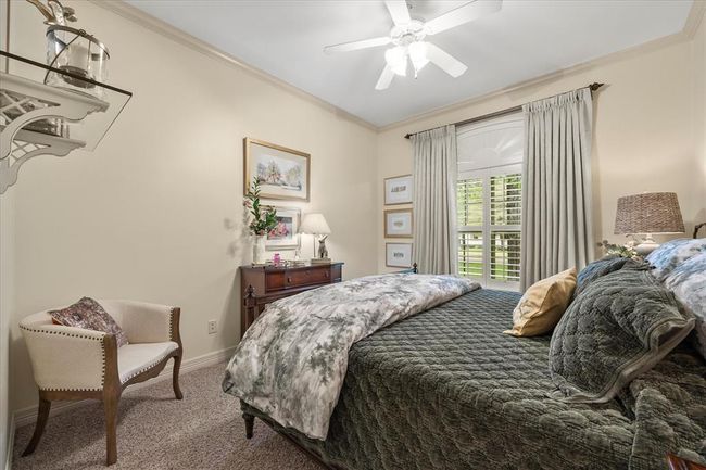 Carpeted bedroom featuring ornamental molding and ceiling fan | Image 26