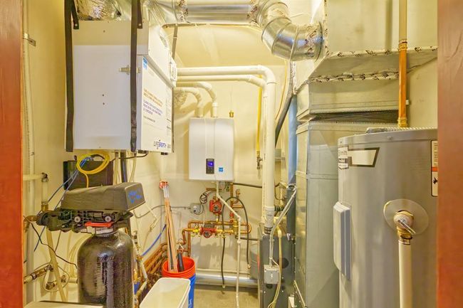 Heat includes both in floor and forced air furnace | Image 22