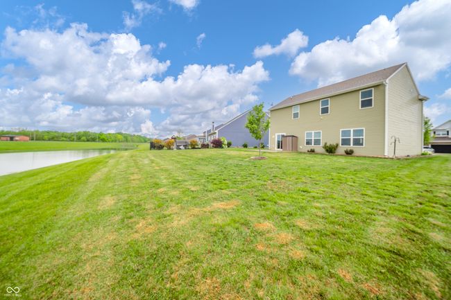 view of green lawn with a water view | Image 36