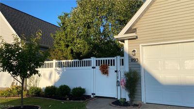 View of property exterior with a garage | Image 2