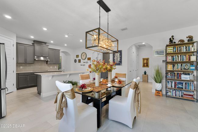 Lovely Dining Area with Custom Lighting | Image 12