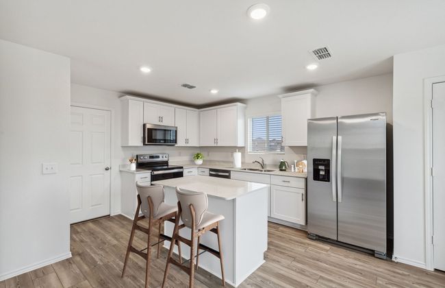 Airy kitchen with ample cabinet space *Photos of furnished model. Not actual home. Representative of floor plan. Some options and features may vary | Image 8