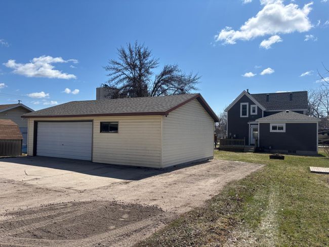Garage View from Alley with parking area along side | Image 30