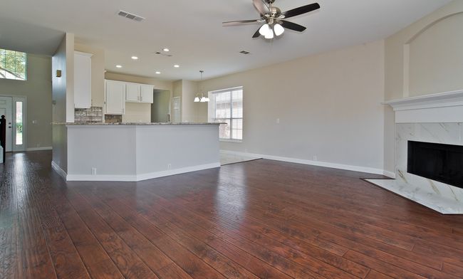 Family Room Opens To The Chef's Kitchen. | Image 11