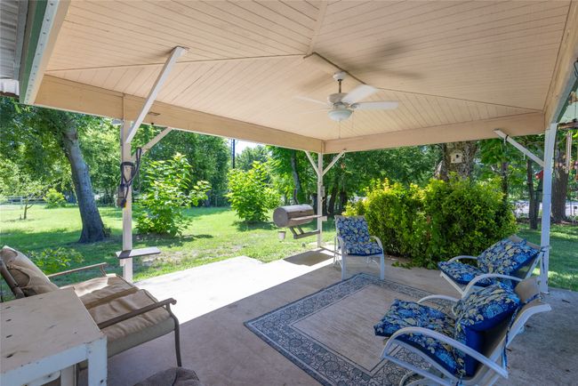 View of patio / terrace with a ceiling fan and a grill | Image 40
