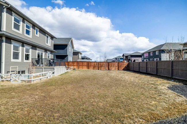 556 Boulder Creek Bay Se, Home with 3 bedrooms, 2 bathrooms and 4 parking in Langdon AB | Image 39