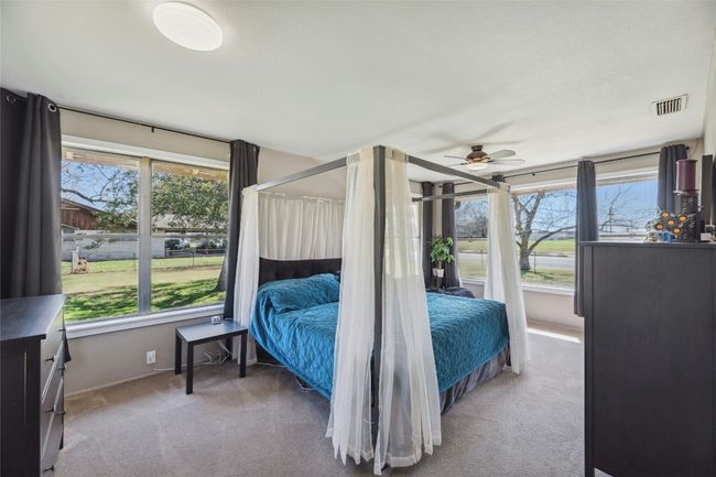 There is a full bath attached to this primary bedroom | Image 13