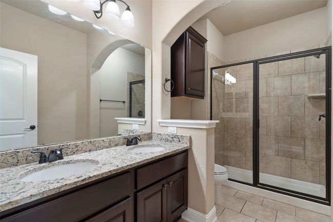 Full bath with double vanity and walk in shower downstairs | Image 22