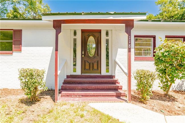 View of exterior entry with covered porch | Image 9