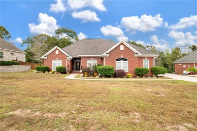 View of front facade featuring a front yard | Image 1