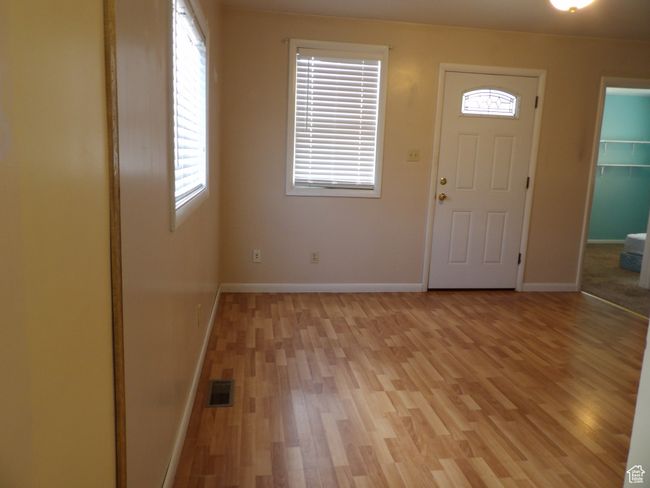 Dining area featuring light wood-type flooring | Image 9
