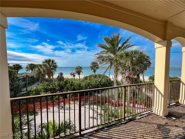 Balcony featuring a water view | Image 25