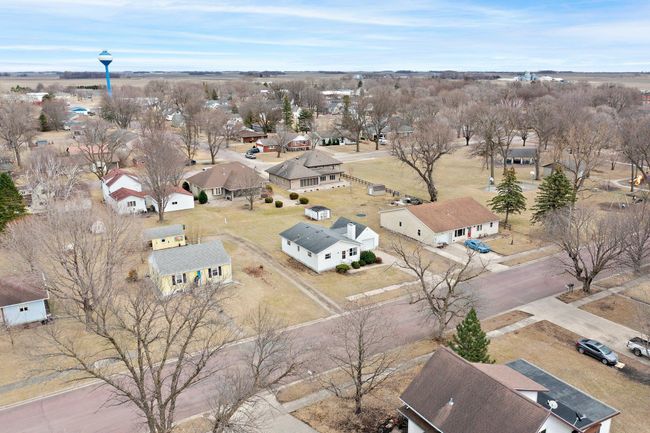 An aerial view of the home and its surrounding neighborhood. | Image 19