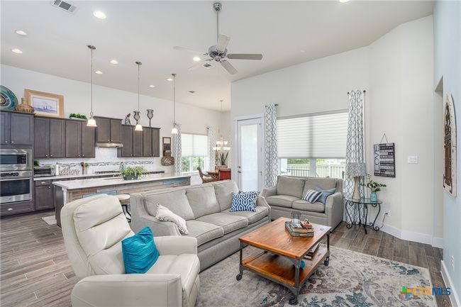 Entire living area toward back door. | Image 9
