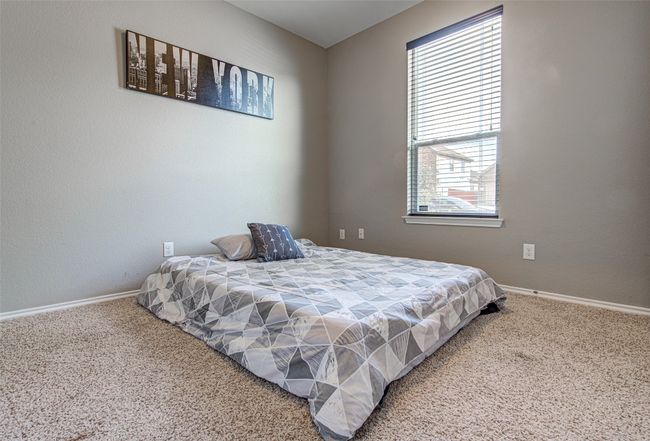 Bedroom with baseboards and carpet floors | Image 19
