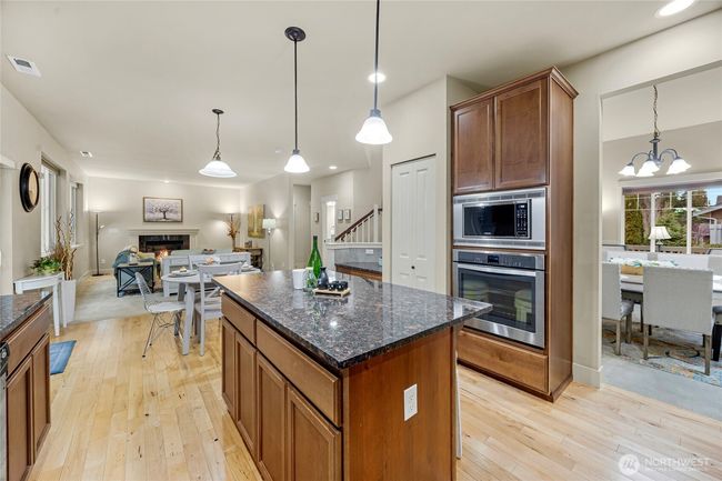 Peak into the formal dining, informal dining & family room | Image 9