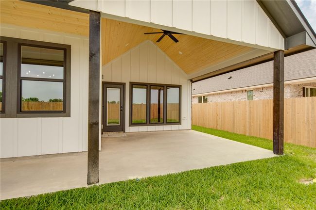 View of patio featuring ceiling fan | Image 34