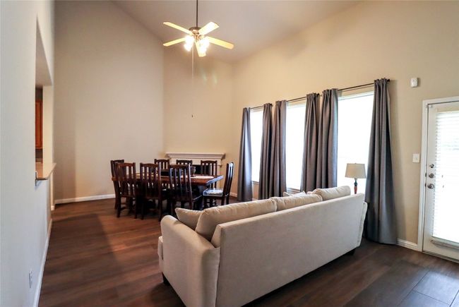 Family room. Notice the super high ceilings. | Image 11