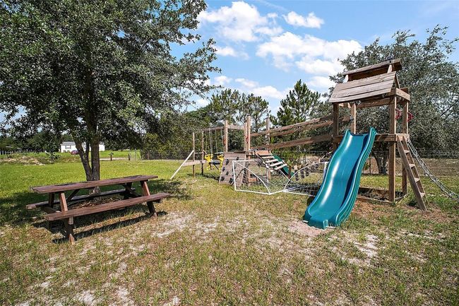 8507 Strawberry Fields Ct, House other with 4 bedrooms, 2 bathrooms and null parking in HOWEY IN THE HILLS FL | Image 6