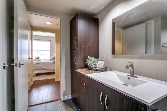 Bathroom featuring vanity and wood finished floors | Image 11