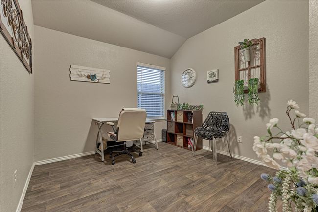 Positioned directly off the foyer/hall, you will find the study. This could be a game room or a home gym if desired. | Image 11