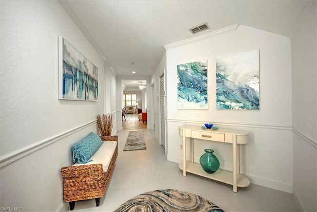 Corridor with visible vents and ornamental molding | Image 5