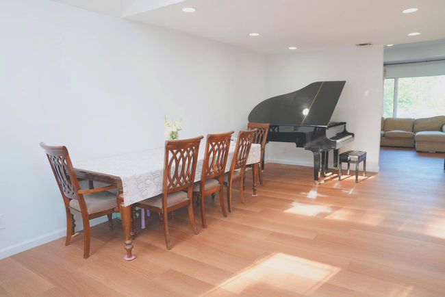 Dining area with wood finished floors and recessed lighting | Image 5