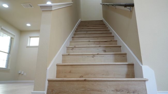 Stairs with new vinyl flooring. | Image 17