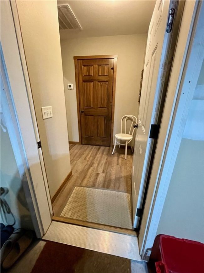 No step entry both at front entry and the garage entry! Easy access for you and your loved ones to visit! | Image 25