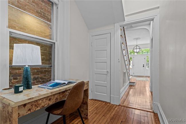 Office with hardwood / wood-style flooring and baseboards | Image 9