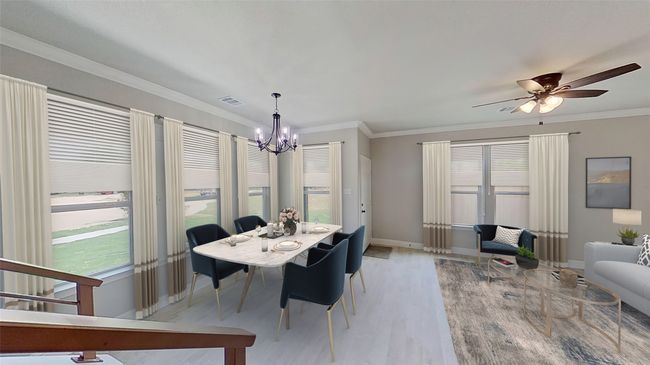Virtually Staged. Dining area with light wood-type flooring, visible vents, crown molding, and baseboards | Image 5