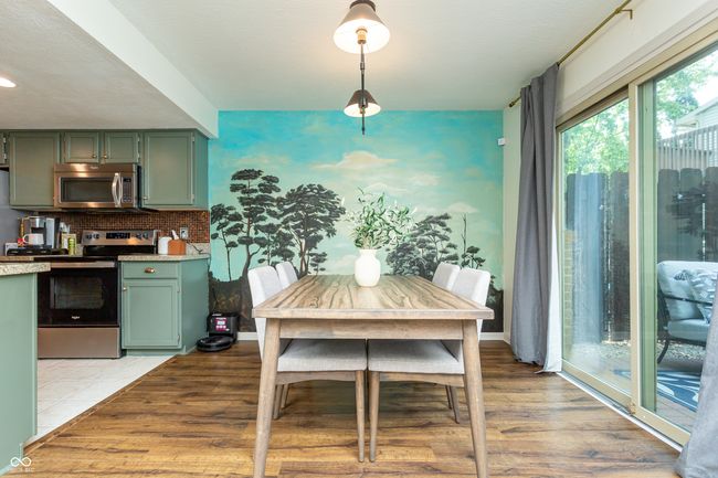 dining room with light wood-style floors and recessed lighting | Image 12