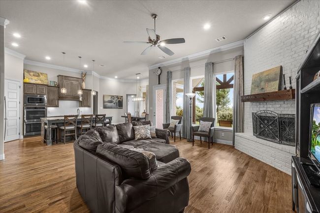 Living room featuring 12-foot ceilings | Image 5