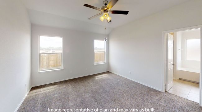 Carpeted empty room with ceiling fan, baseboards, and vaulted ceiling | Image 15