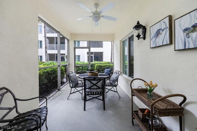 Patio with ceiling fan and plenty of seating | Image 20