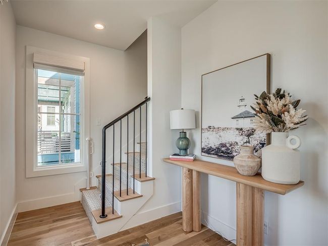 Stairway featuring wood finished floors, baseboards, and recessed lighting | Image 6